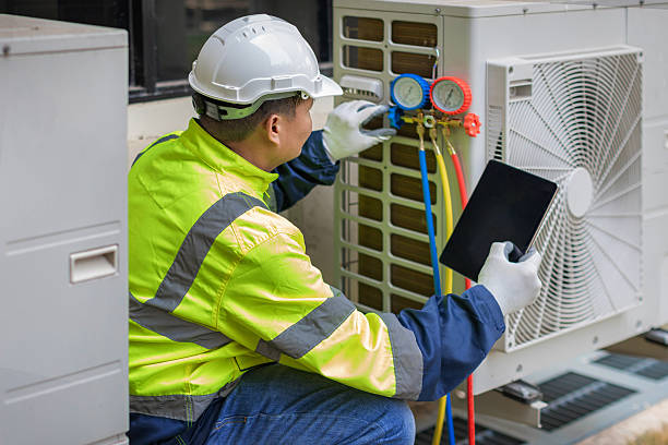 Professional Air Duct Cleaning technician working in Brookhaven, NY